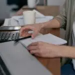 an image of a lady doing her home finances.