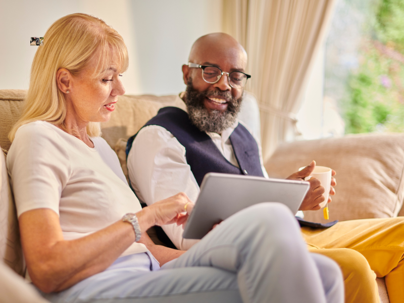 Family discussing different insurance plans together.