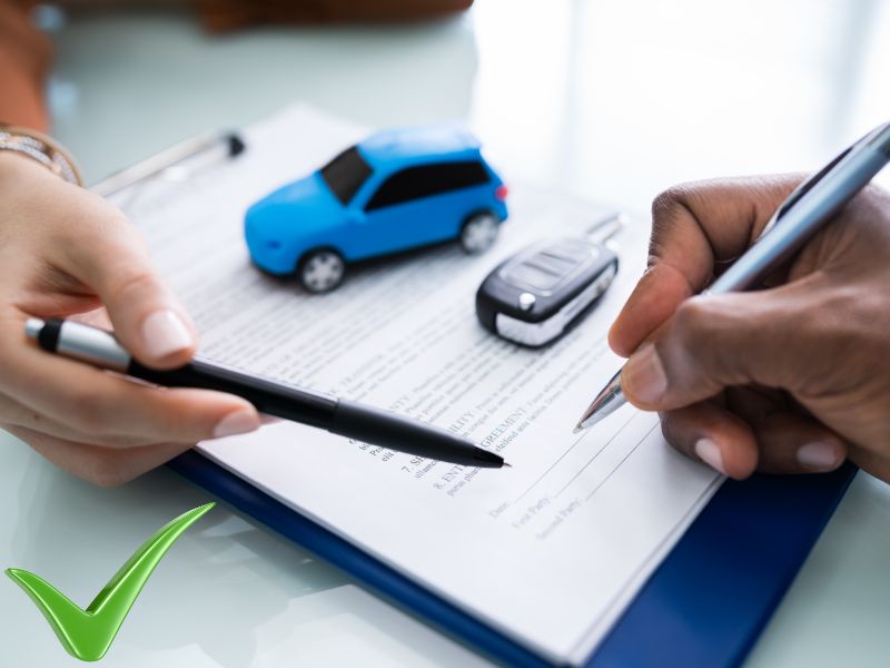 Can You Lease a Car with Bad Credit — person signing a lease at a dealership
